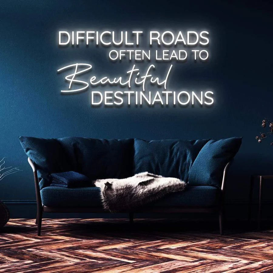 "DIFFICULT ROADS LEAD TO BEAUTIFUL DESTINATIONS" NEON SIGN