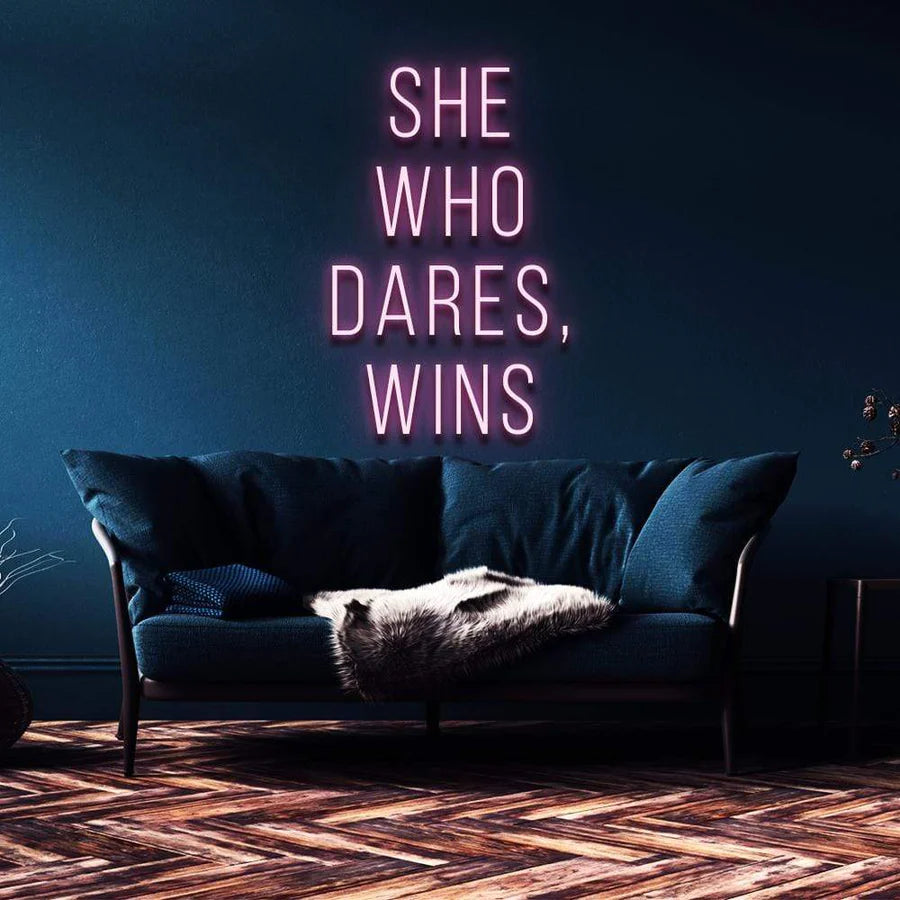 "SHE WHO DARES, WINS" NEON SIGN