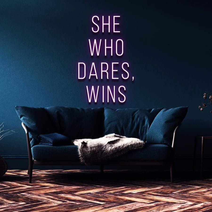 "SHE WHO DARES, WINS" NEON SIGN