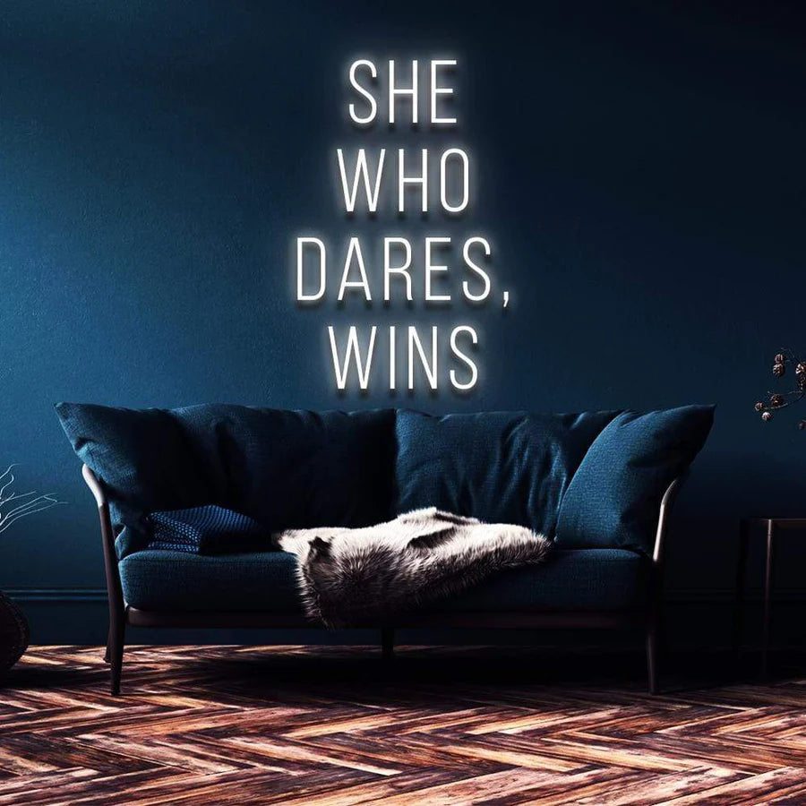 "SHE WHO DARES, WINS" NEON SIGN